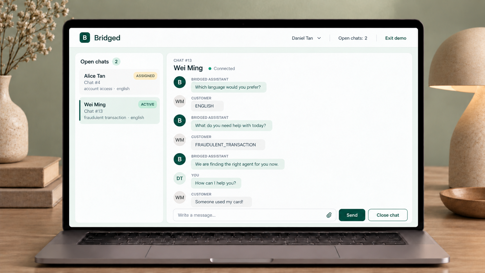Bridged agent workspace showing assigned and active chats on a laptop in a sage and warm-brown setting